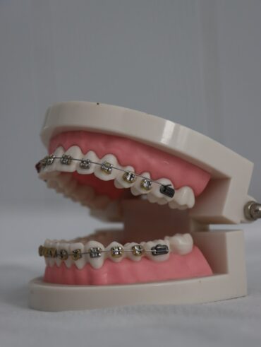 a pink cake with a white frosting and a pink frosting