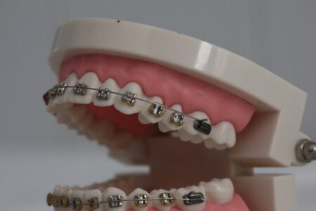 a pink cake with a white frosting and a pink frosting