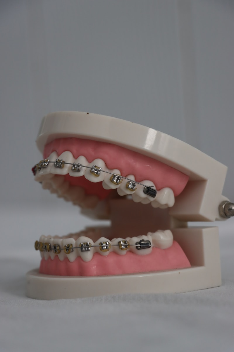 a pink cake with a white frosting and a pink frosting